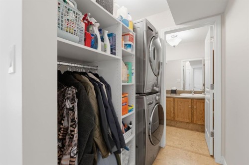 352 Oakside Circle Sw, Calgary, AB - Indoor Photo Showing Laundry Room