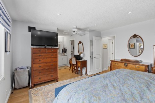 352 Oakside Circle Sw, Calgary, AB - Indoor Photo Showing Bedroom
