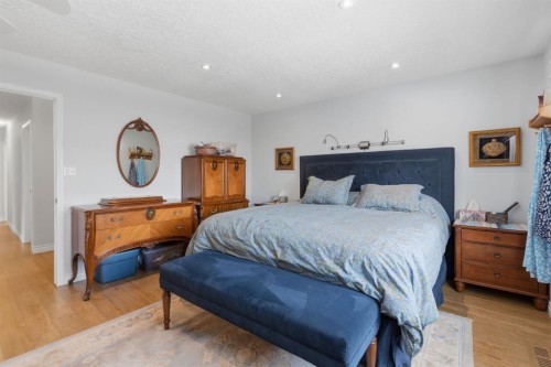 352 Oakside Circle Sw, Calgary, AB - Indoor Photo Showing Bedroom