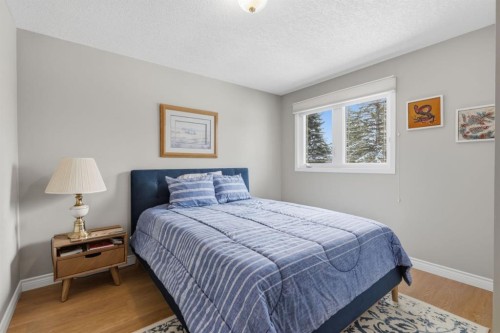 352 Oakside Circle Sw, Calgary, AB - Indoor Photo Showing Bedroom