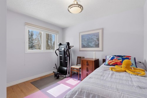 352 Oakside Circle Sw, Calgary, AB - Indoor Photo Showing Bedroom