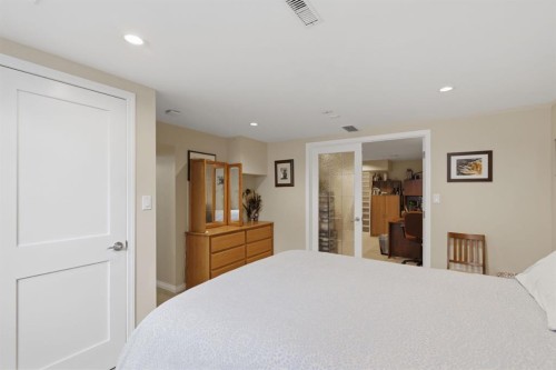 352 Oakside Circle Sw, Calgary, AB - Indoor Photo Showing Bedroom