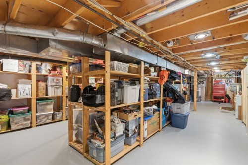 352 Oakside Circle Sw, Calgary, AB - Indoor Photo Showing Basement