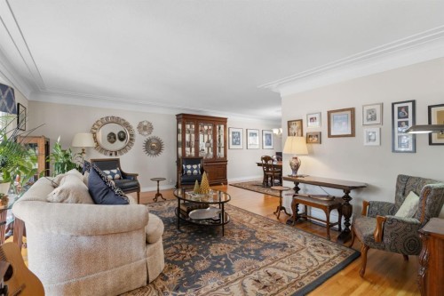 352 Oakside Circle Sw, Calgary, AB - Indoor Photo Showing Living Room