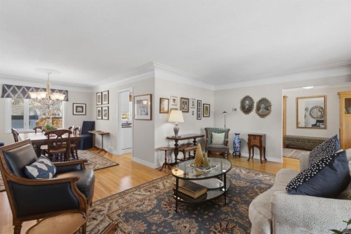 352 Oakside Circle Sw, Calgary, AB - Indoor Photo Showing Living Room