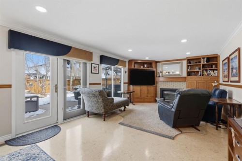 352 Oakside Circle Sw, Calgary, AB - Indoor With Fireplace