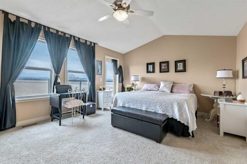 43 Sheep River Heights, Okotoks, AB - Indoor Photo Showing Bedroom