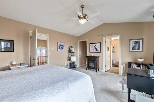 43 Sheep River Heights, Okotoks, AB - Indoor Photo Showing Bedroom