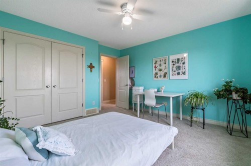 43 Sheep River Heights, Okotoks, AB - Indoor Photo Showing Bedroom