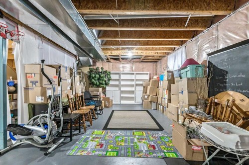 43 Sheep River Heights, Okotoks, AB - Indoor Photo Showing Basement