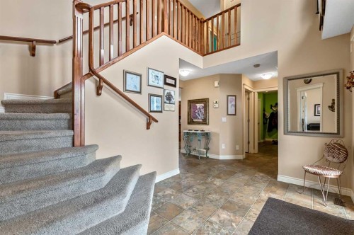 43 Sheep River Heights, Okotoks, AB - Indoor Photo Showing Other Room