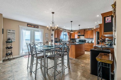 43 Sheep River Heights, Okotoks, AB - Indoor Photo Showing Other Room