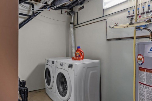 323 Hoodoo Crescent, Canmore, AB - Indoor Photo Showing Laundry Room