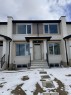 1997 Mccaskill Drive, Crossfield, AB  - Outdoor With Facade 