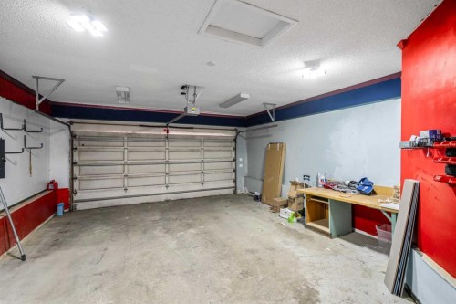 48 Douglas Park Boulevard Se, Calgary, AB - Indoor Photo Showing Garage
