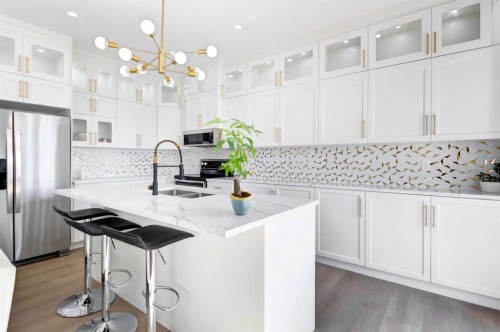 37 Royal Birch Landing Nw, Calgary, AB - Indoor Photo Showing Kitchen With Stainless Steel Kitchen With Double Sink With Upgraded Kitchen