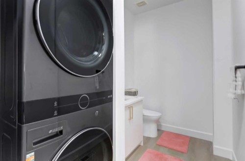 37 Royal Birch Landing Nw, Calgary, AB - Indoor Photo Showing Laundry Room