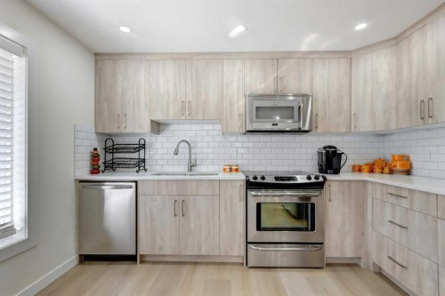 37 Royal Birch Landing Nw, Calgary, AB - Indoor Photo Showing Kitchen With Stainless Steel Kitchen With Upgraded Kitchen