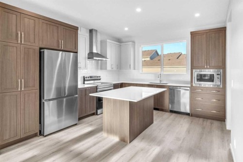 20 Iris Crescent, Okotoks, AB - Indoor Photo Showing Kitchen With Upgraded Kitchen