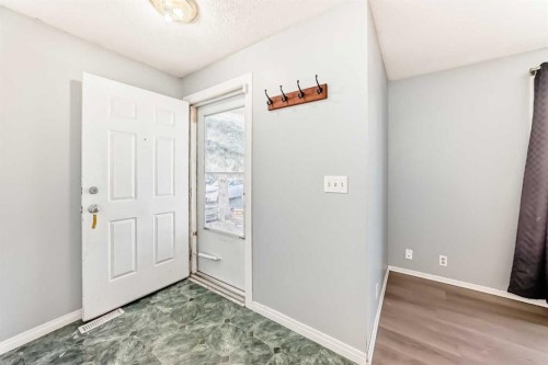 63 Falshire Place Ne, Calgary, AB - Indoor Photo Showing Other Room