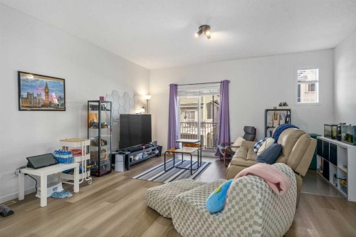 628 Copperstone Manor Se, Calgary, AB - Indoor Photo Showing Living Room