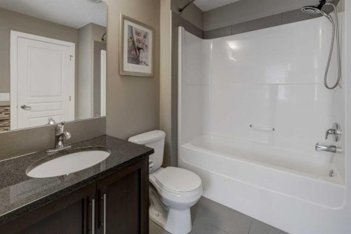 147 Panatella Hill, Calgary, AB - Indoor Photo Showing Bathroom