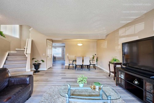 188 Silverado Plains Close Sw, Calgary, AB - Indoor Photo Showing Living Room