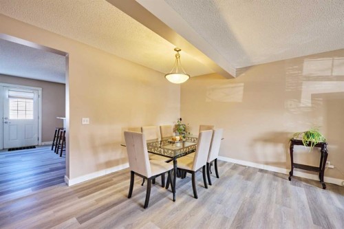 188 Silverado Plains Close Sw, Calgary, AB - Indoor Photo Showing Dining Room