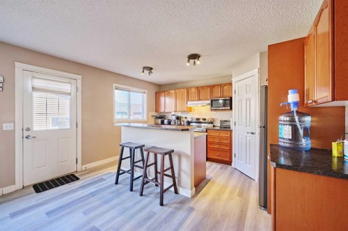 188 Silverado Plains Close Sw, Calgary, AB - Indoor Photo Showing Kitchen