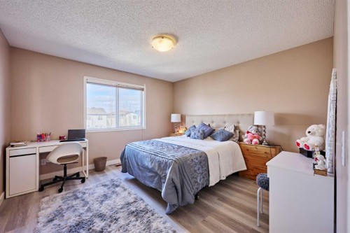 188 Silverado Plains Close Sw, Calgary, AB - Indoor Photo Showing Bedroom