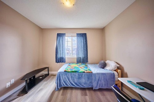 188 Silverado Plains Close Sw, Calgary, AB - Indoor Photo Showing Bedroom