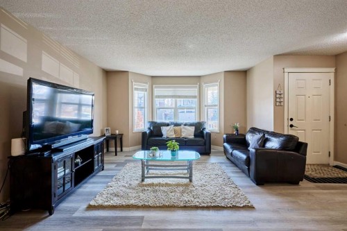 188 Silverado Plains Close Sw, Calgary, AB - Indoor Photo Showing Living Room