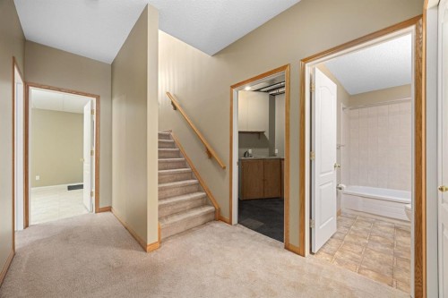 35 Scimitar Heath Nw, Calgary, AB - Indoor Photo Showing Other Room