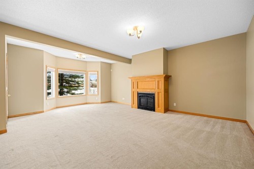 35 Scimitar Heath Nw, Calgary, AB - Indoor With Fireplace