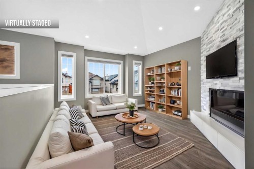 125 Saddlefield Crescent Ne, Calgary, AB - Indoor Photo Showing Living Room With Fireplace
