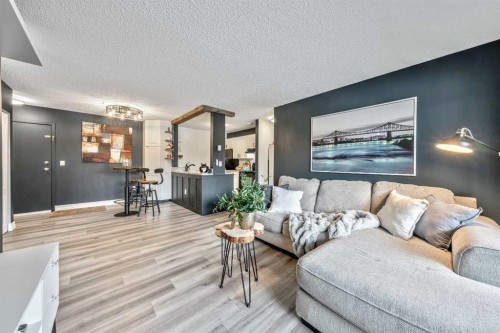 106-10 Dover Point Se, Calgary, AB - Indoor Photo Showing Living Room