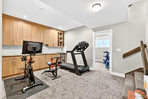 3736 44 Street Sw, Calgary, AB - Indoor Photo Showing Gym Room