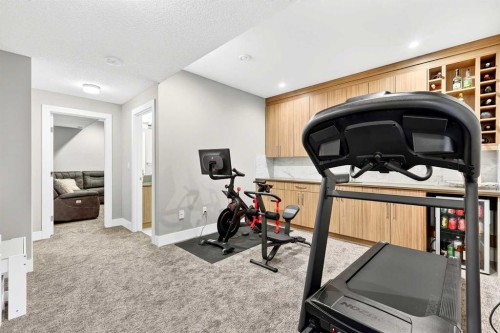 3736 44 Street Sw, Calgary, AB - Indoor Photo Showing Gym Room