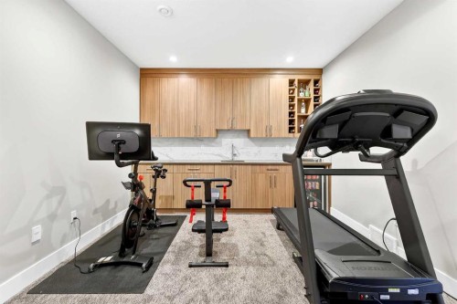 3736 44 Street Sw, Calgary, AB - Indoor Photo Showing Gym Room