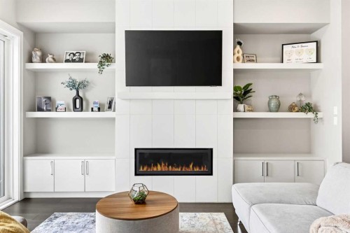 3736 44 Street Sw, Calgary, AB - Indoor Photo Showing Living Room With Fireplace