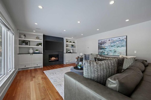 116 Bay View Drive Sw, Calgary, AB - Indoor Photo Showing Living Room With Fireplace