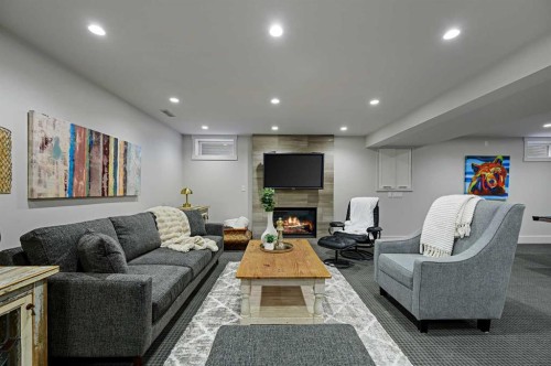 116 Bay View Drive Sw, Calgary, AB - Indoor With Fireplace