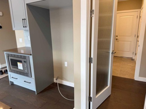 115 Sundown Crescent, Cochrane, AB - Indoor Photo Showing Other Room