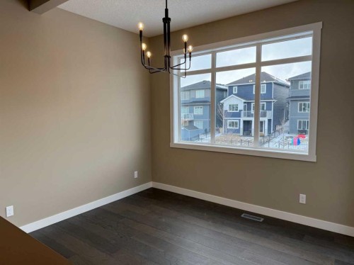 115 Sundown Crescent, Cochrane, AB - Indoor Photo Showing Other Room