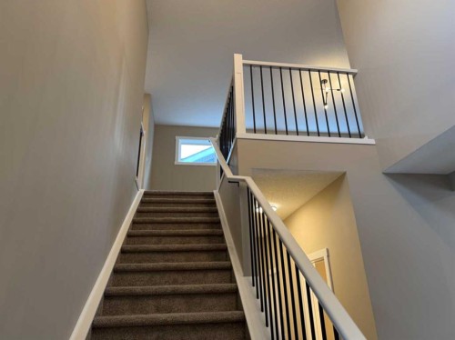 115 Sundown Crescent, Cochrane, AB - Indoor Photo Showing Other Room