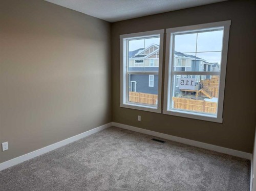115 Sundown Crescent, Cochrane, AB - Indoor Photo Showing Other Room
