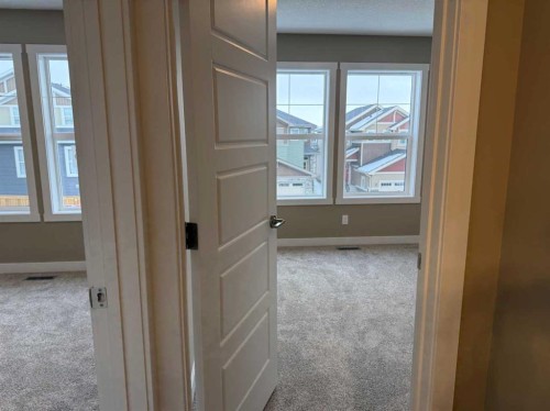 115 Sundown Crescent, Cochrane, AB - Indoor Photo Showing Other Room