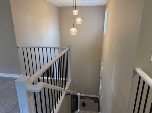 115 Sundown Crescent, Cochrane, AB - Indoor Photo Showing Other Room