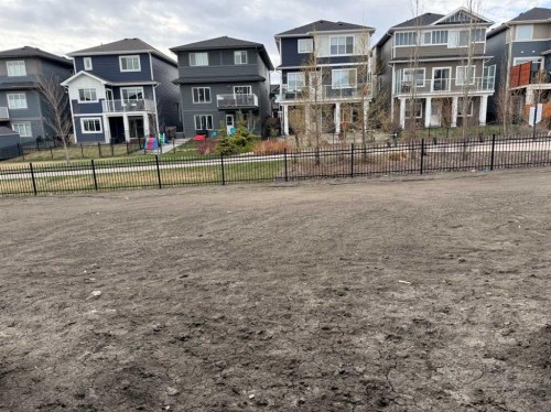 115 Sundown Crescent, Cochrane, AB - Outdoor With Facade