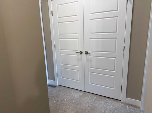 115 Sundown Crescent, Cochrane, AB - Indoor Photo Showing Other Room